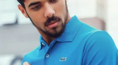 man-wearing-blue-lacoste-polo-shirt-and-silver-colored-1232459.jpg