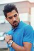 man-wearing-blue-lacoste-polo-shirt-and-silver-colored-1232459.jpg